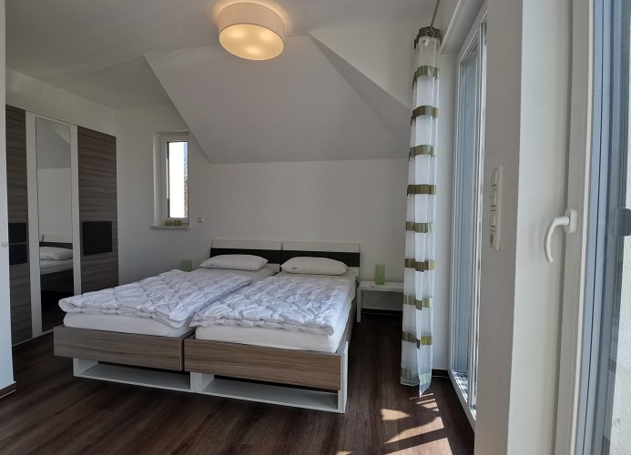 Schlafzimmer 1 im 1. OG