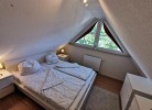 Doppelbett im 4. Schlafzimmer im Dachgeschoss
