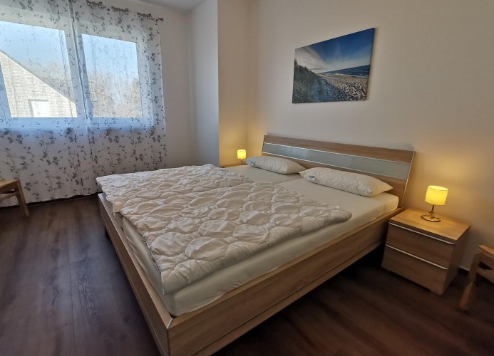 Schlafzimmer 2 im 1. OG